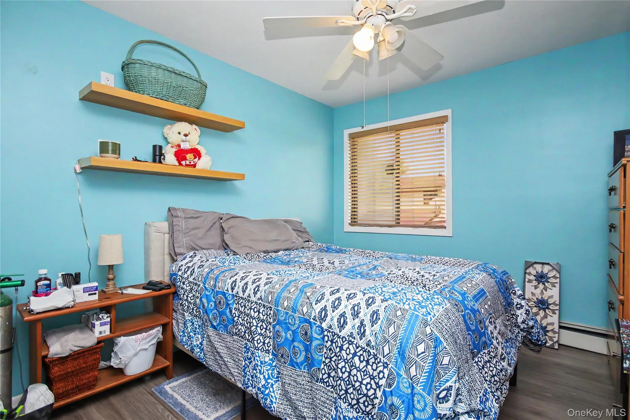 Bedroom with big window and ceiling fan Bedroom with big window and ceiling fan