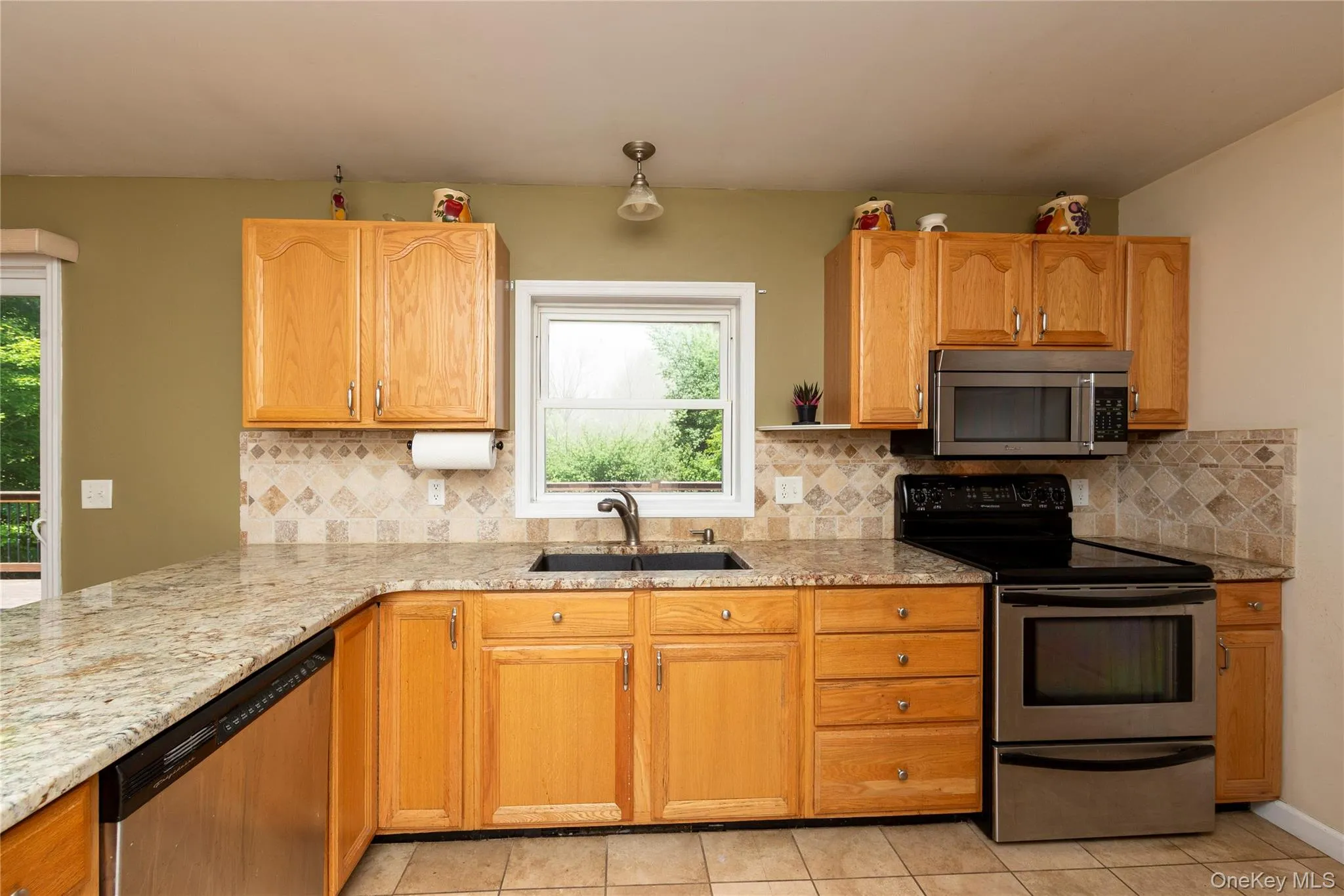 Updated appliances with abundant cabinetry and counter space. Updated appliances with abundant cabinetry and counter space.