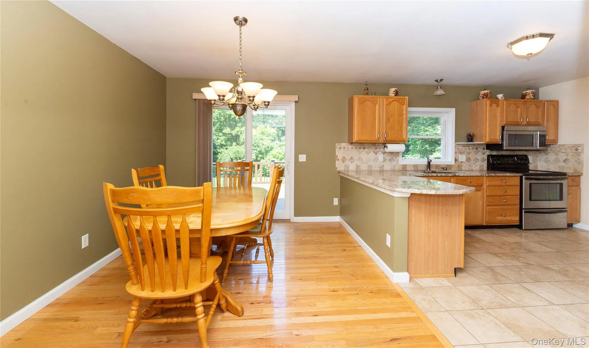 Country kitchen open to the dining area. Country kitchen open to the dining area.