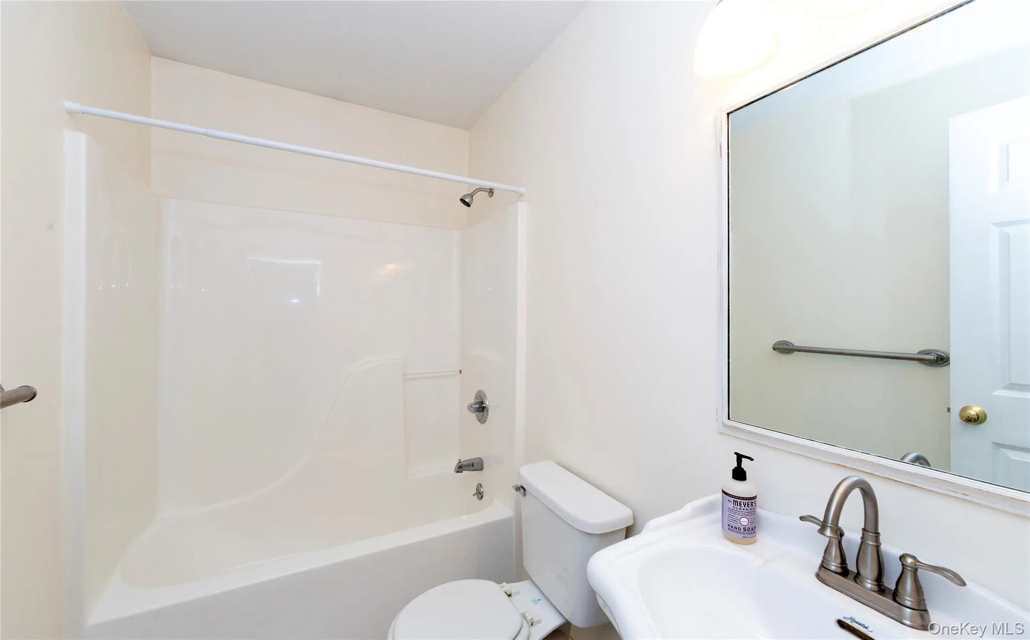 Adjacent to the den, a hall full bath. Adjacent to the den, a hall full bath.
