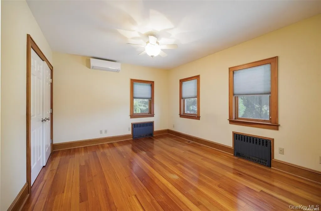 Second Floor, Lovely Sunny Primary Bedroom with 6 Foot Closet and Beautiful Hardwood Floors Second Floor, Lovely Sunny Primary Bedroom with 6 Foot Closet and Beautiful Hardwood Floors