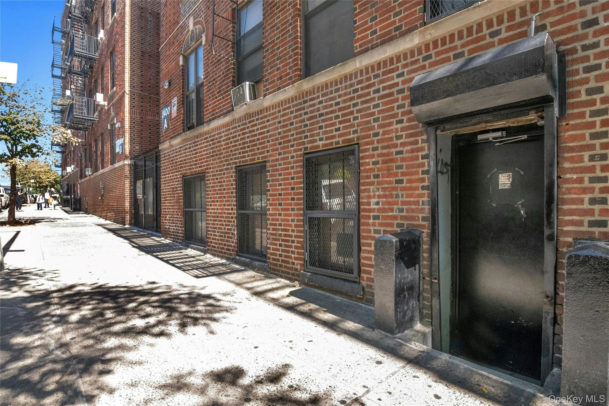 View of exterior entry with brick siding View of exterior entry with brick siding