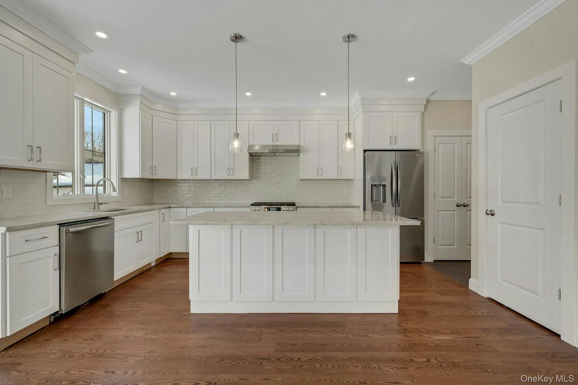 Kitchen with center island and pendant lighting Kitchen with center island and pendant lighting