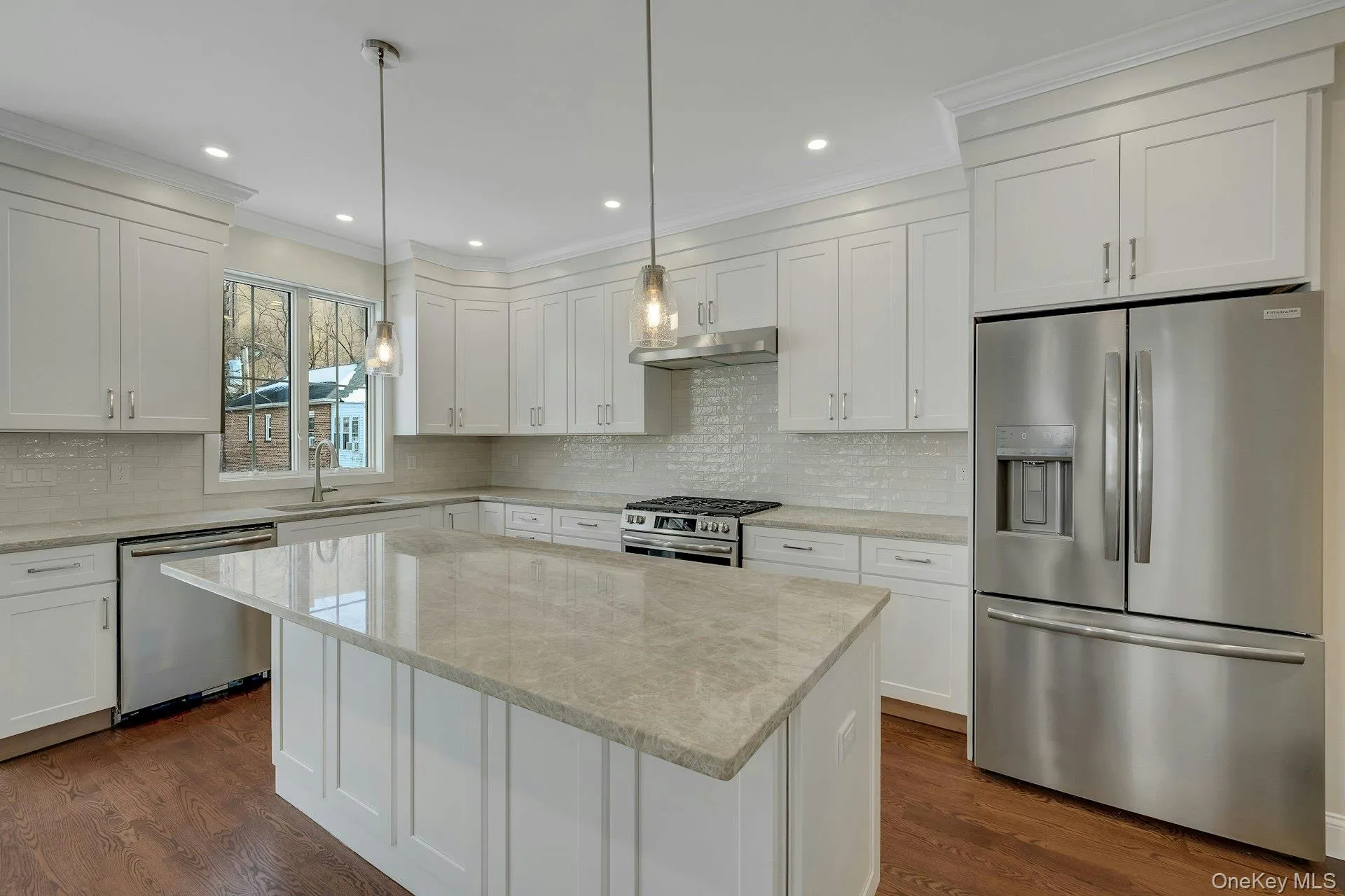 Another view of Open Kitchen showing quart counters, stainless steel appliances Another view of Open Kitchen showing quart counters, stainless steel appliances