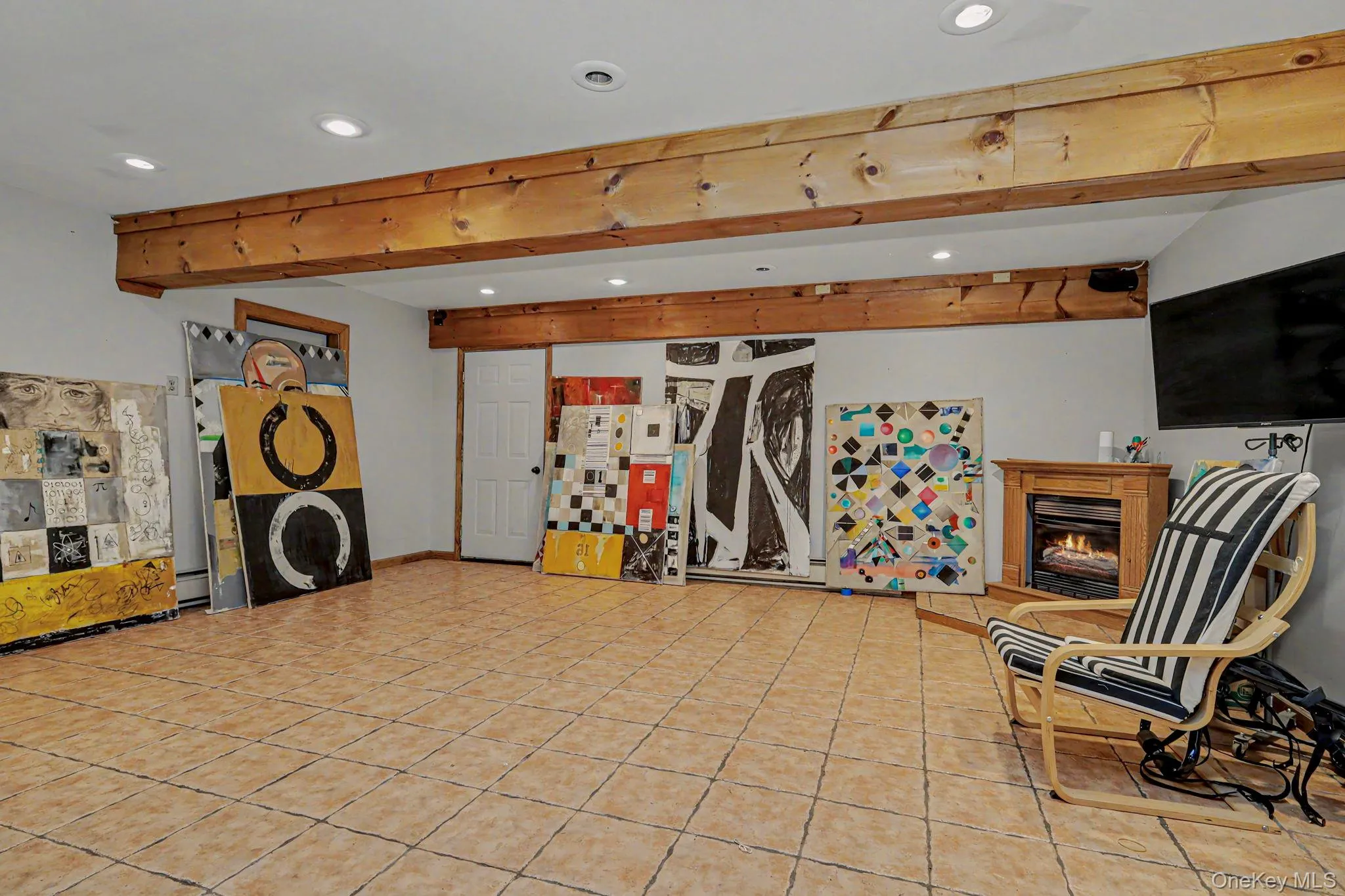 lower level family room with gas fireplace lower level family room with gas fireplace