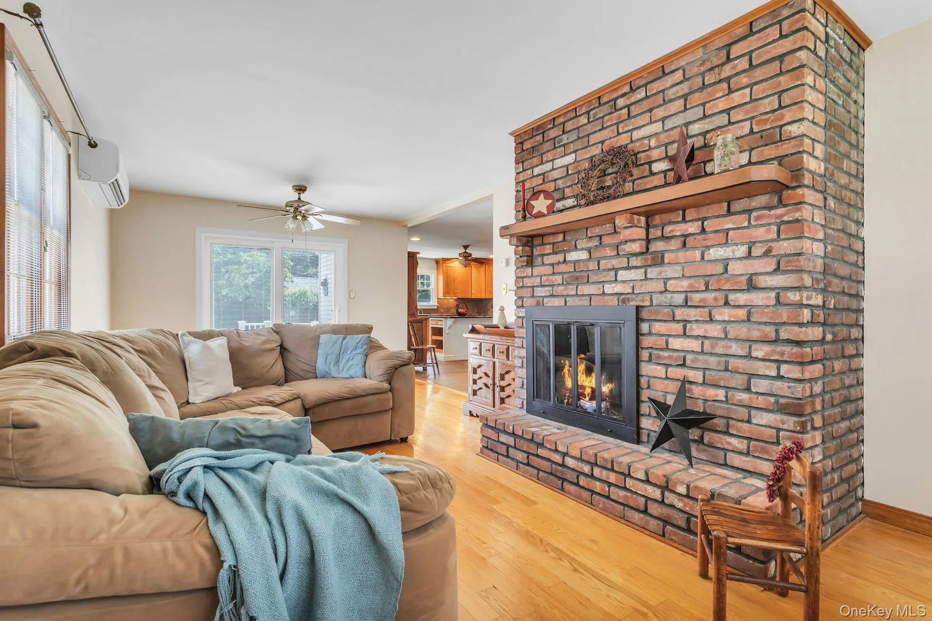 Brick fireplace with a wood mantel Brick fireplace with a wood mantel