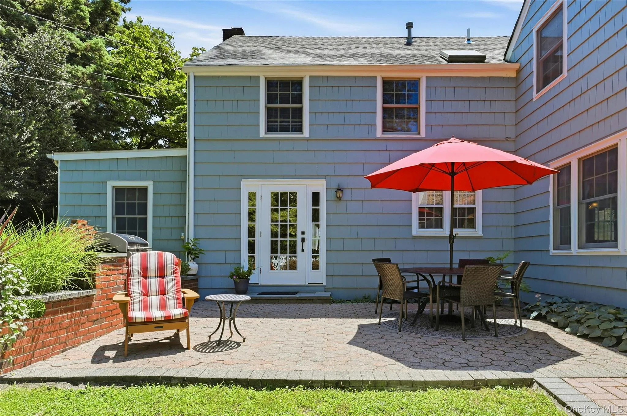 Large patio overlooks backyard Large patio overlooks backyard