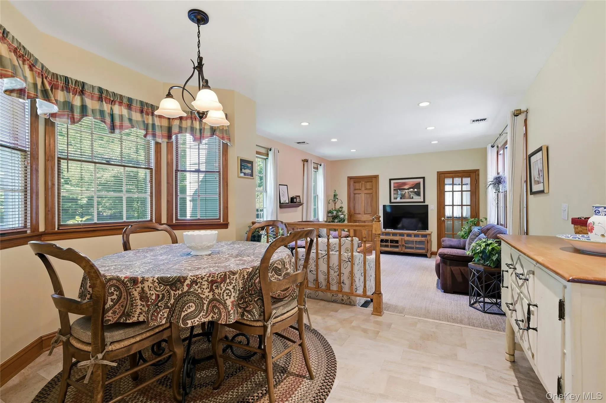 Located next to kitchen & family room Located next to kitchen & family room