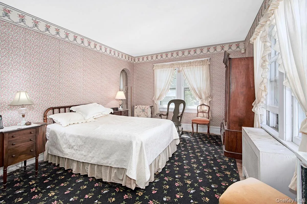 Primary Bedroom with Hardwood Floors Primary Bedroom with Hardwood Floors