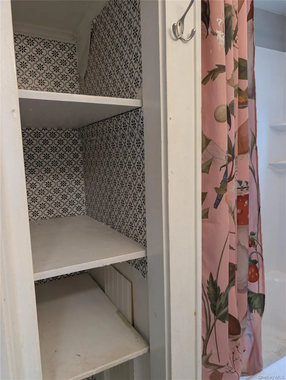 Custom shelving in bathroom for towels and supplies Custom shelving in bathroom for towels and supplies