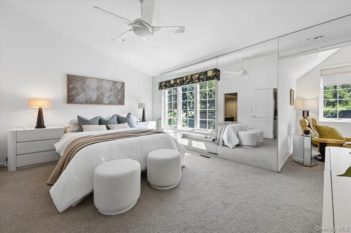 Inviting, sunny primary suite w/ alcove, two walk in closets Inviting, sunny primary suite w/ alcove, two walk in closets