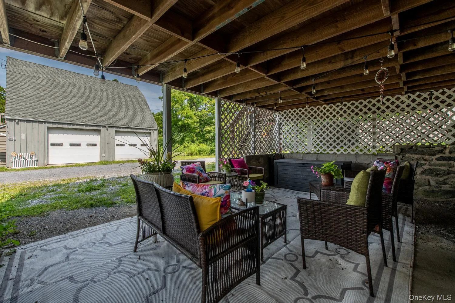 Covered outdoor space under enclosed-back porch Covered outdoor space under enclosed-back porch