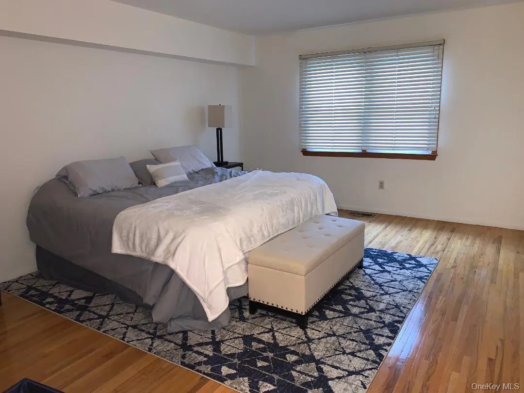 Huge primary bedroom has beautful wood floors and 2 double closets. Huge primary bedroom has beautful wood floors and 2 double closets.