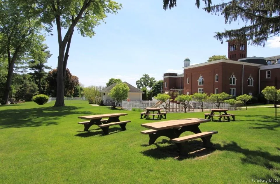 The Green space is yours to enjoy picniciing or chatting on a spring, summer or fall day. The Green space is yours to enjoy picniciing or chatting on a spring, summer or fall day.