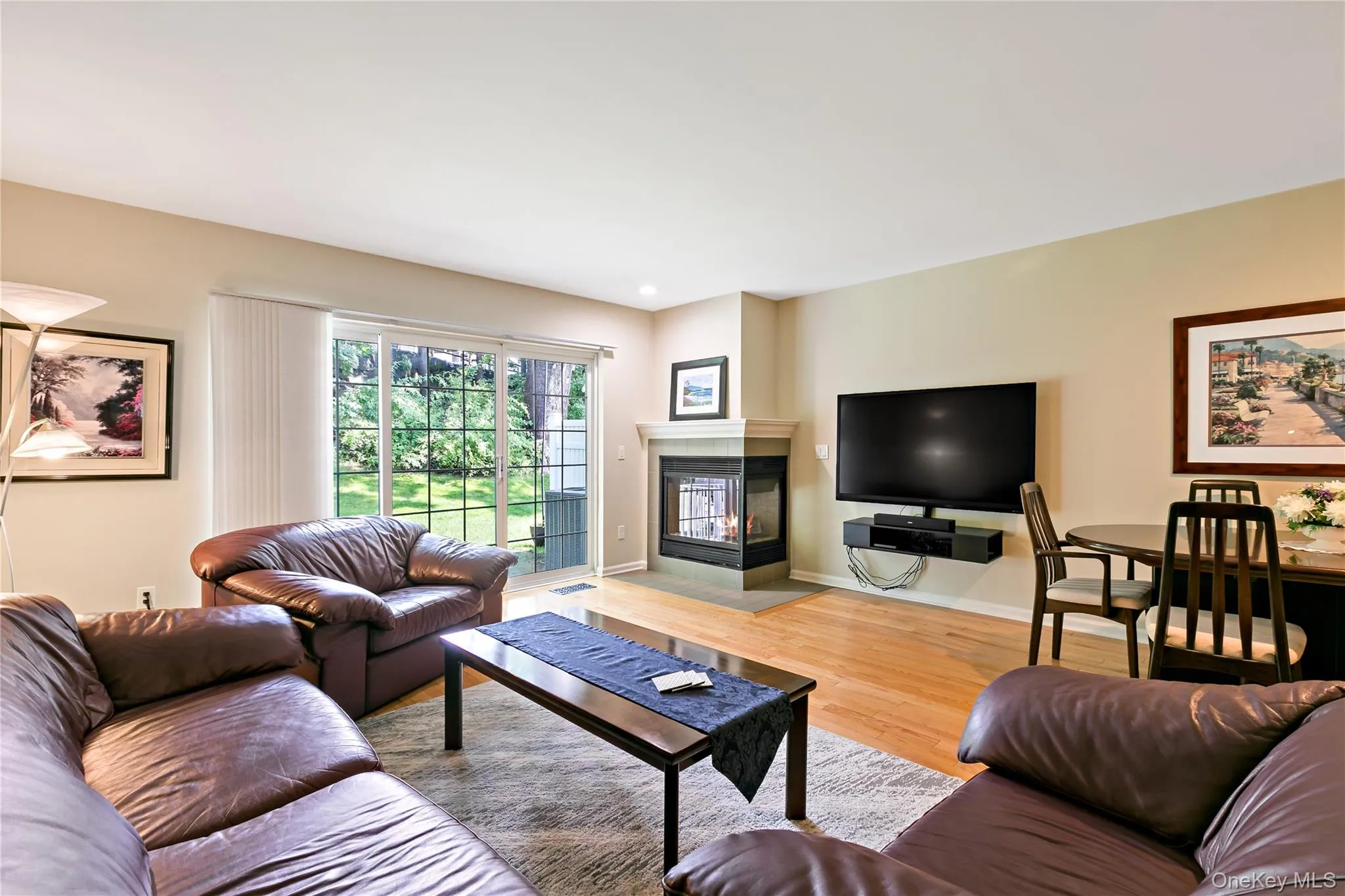 Enjoy all seasons in this space with fireplace, sliders to your patio, so great for everyday and entertaining. Enjoy all seasons in this space with fireplace, sliders to your patio, so great for everyday and entertaining.