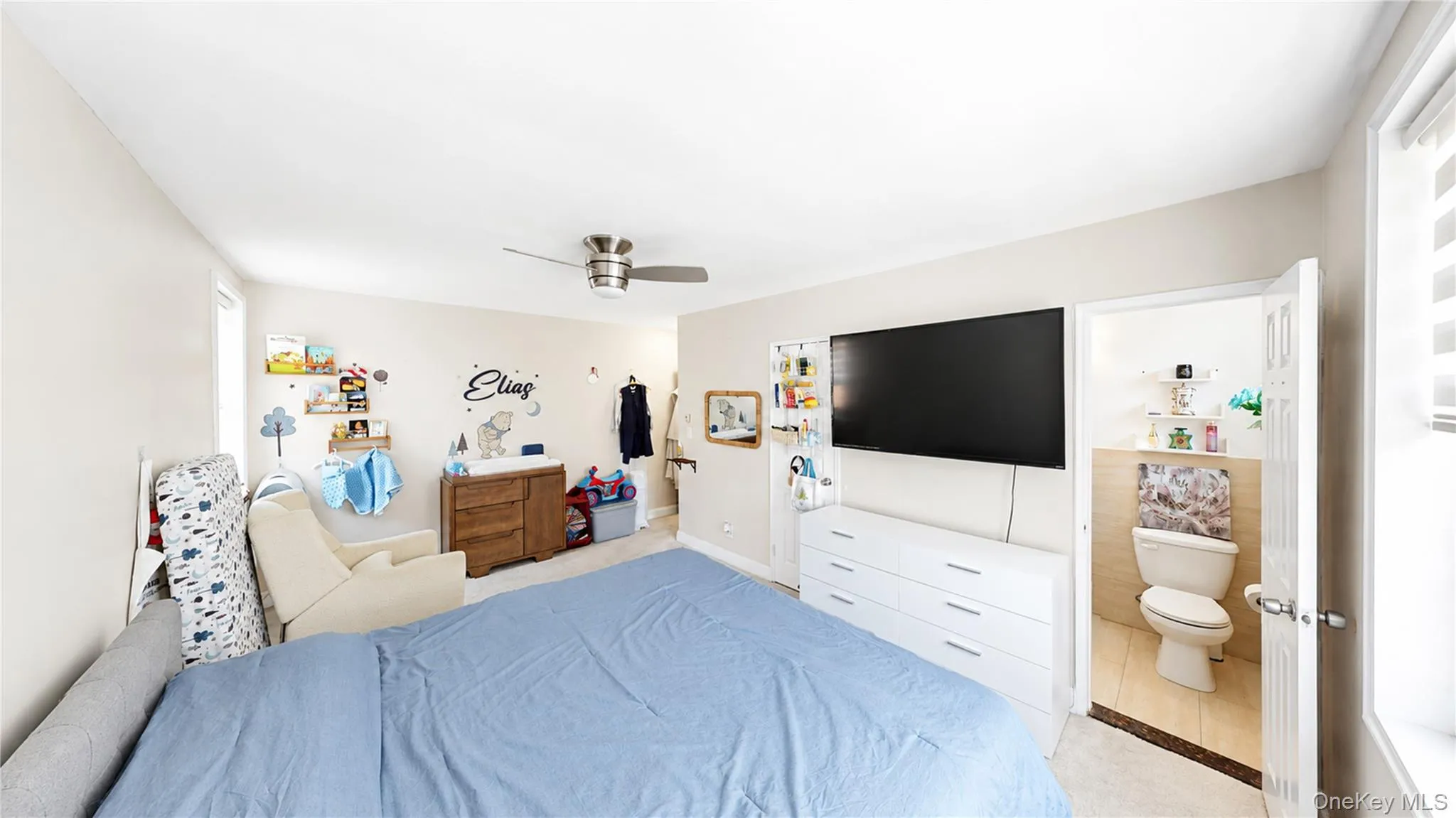 Neutral-toned walls complement the room's light-colored flooring Neutral-toned walls complement the room's light-colored flooring