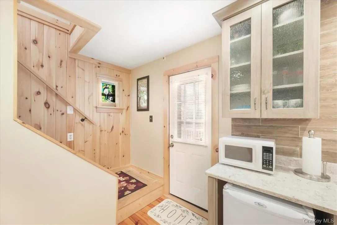 Door to DECK of the Great room with stairway to Bedrooms & Upper Deck Door to DECK of the Great room with stairway to Bedrooms & Upper Deck