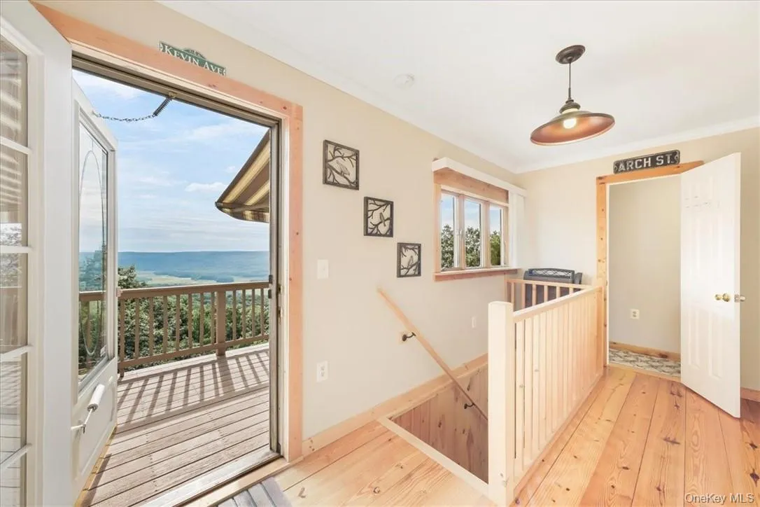 Door from sitting area to DECK OVERLOOKING the Bashakill. 2nd Level with Beautiful Views. Enjoy magnificent Nature,Birds & wildlife. Door from sitting area to DECK OVERLOOKING the Bashakill. 2nd Level with Beautiful Views. Enjoy magnificent Nature,Birds & wildlife.