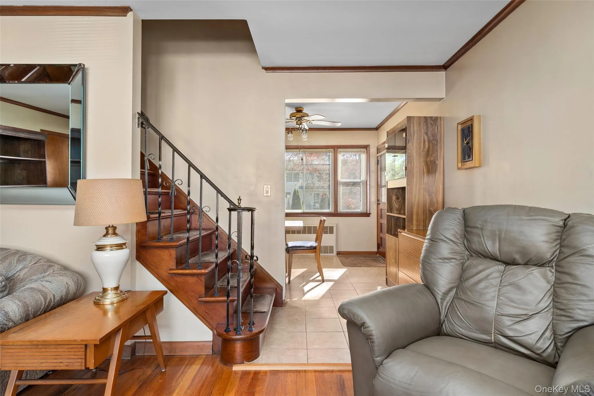 Staircase to upstairs is between Living Room and Dining Room Staircase to upstairs is between Living Room and Dining Room