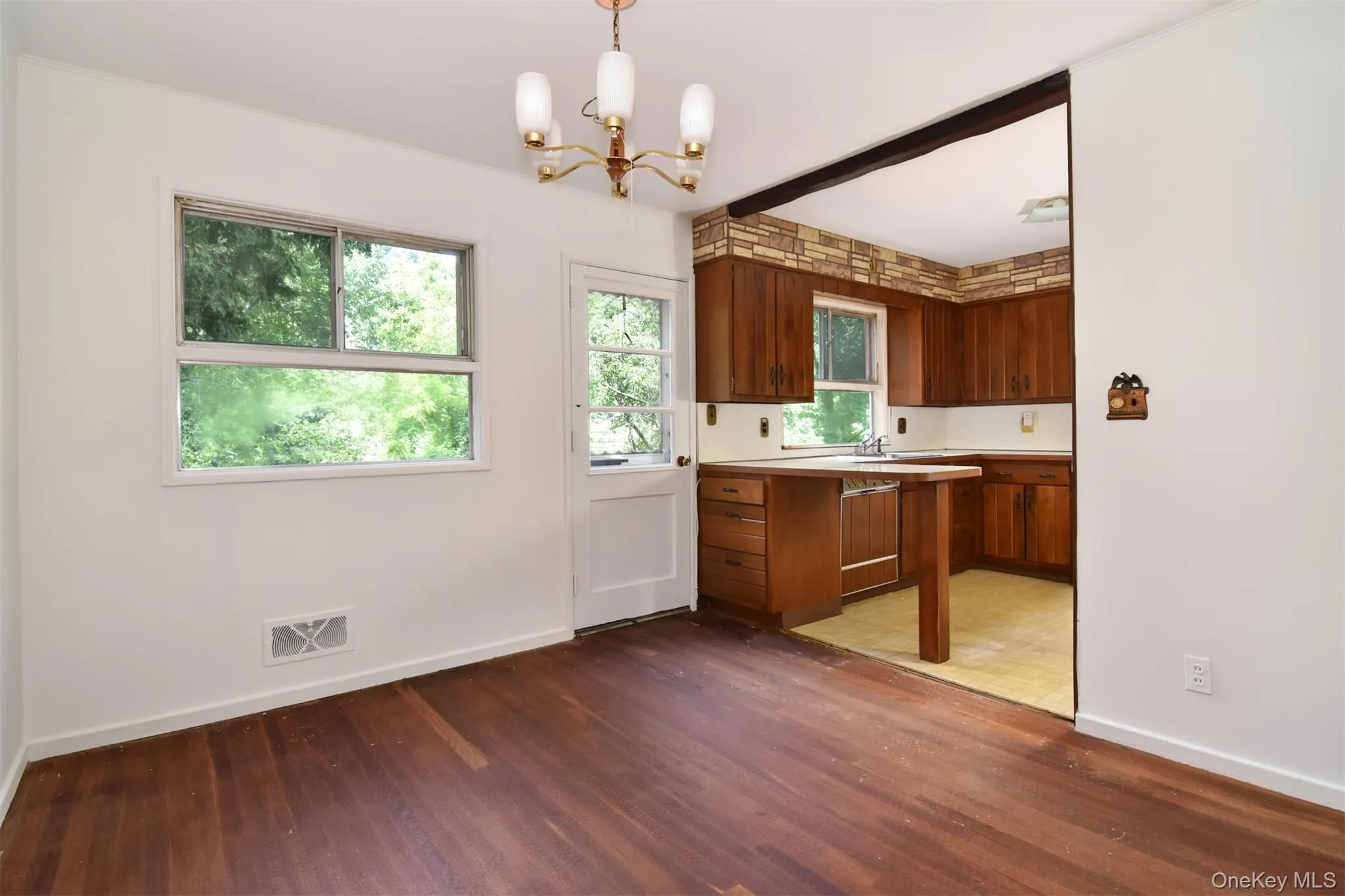 Easy access to the deck and backyard off the dining room. Easy access to the deck and backyard off the dining room.