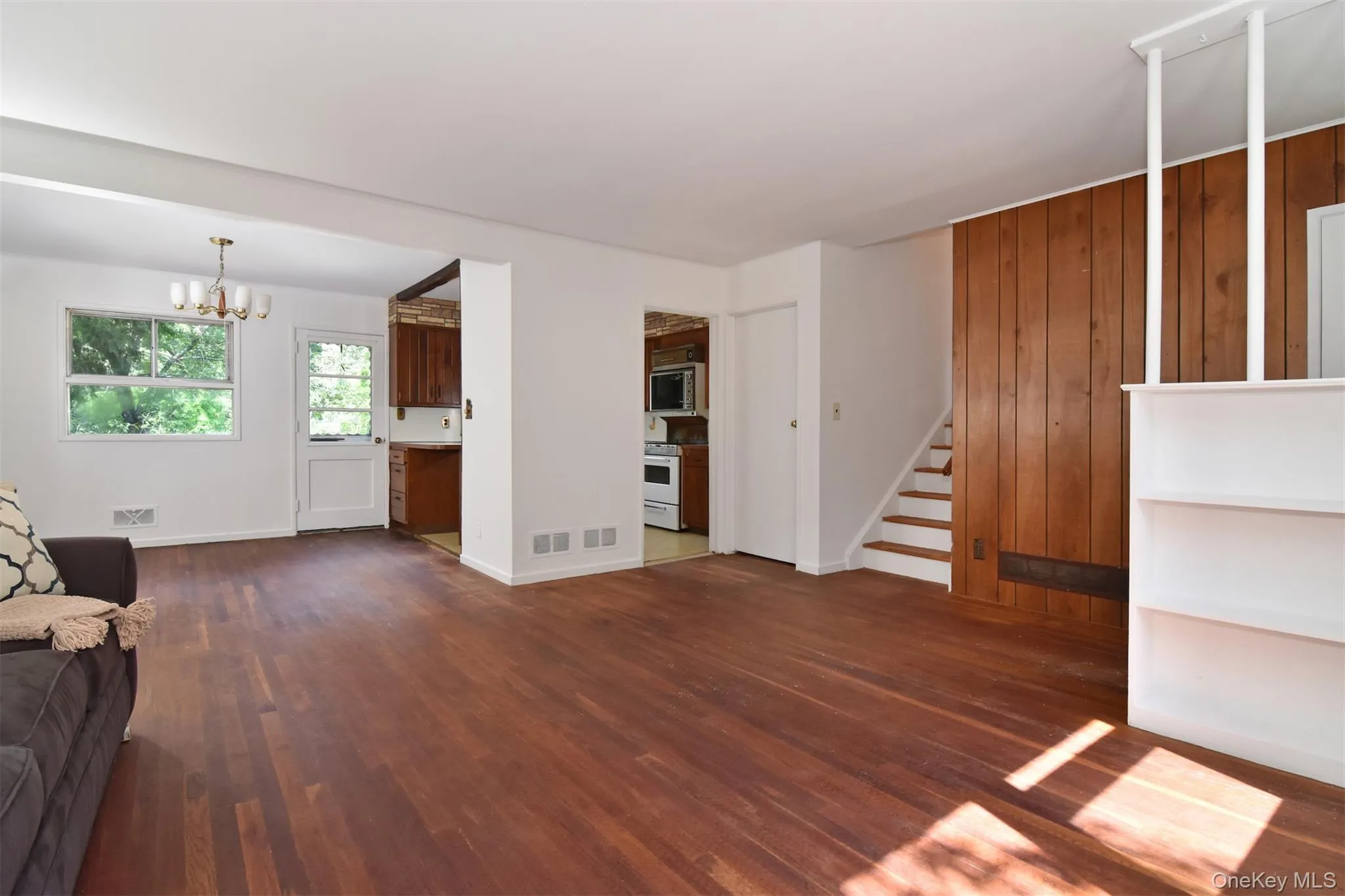 Easy access upstairs to bedrooms and downstairs to the Lower level. Easy access upstairs to bedrooms and downstairs to the Lower level.