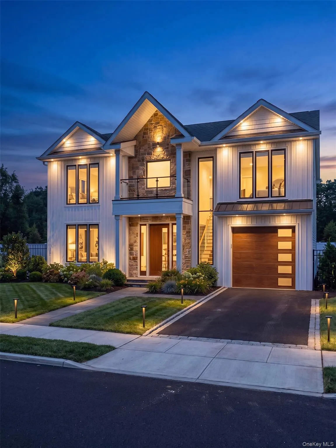 Modern architectural design featuring board-and-batten siding and stone accents Modern architectural design featuring board-and-batten siding and stone accents