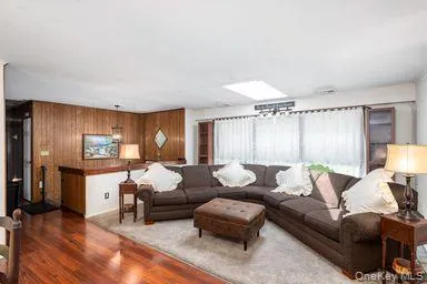 Spacious Living room with three windows & bookcase Spacious Living room with three windows & bookcase