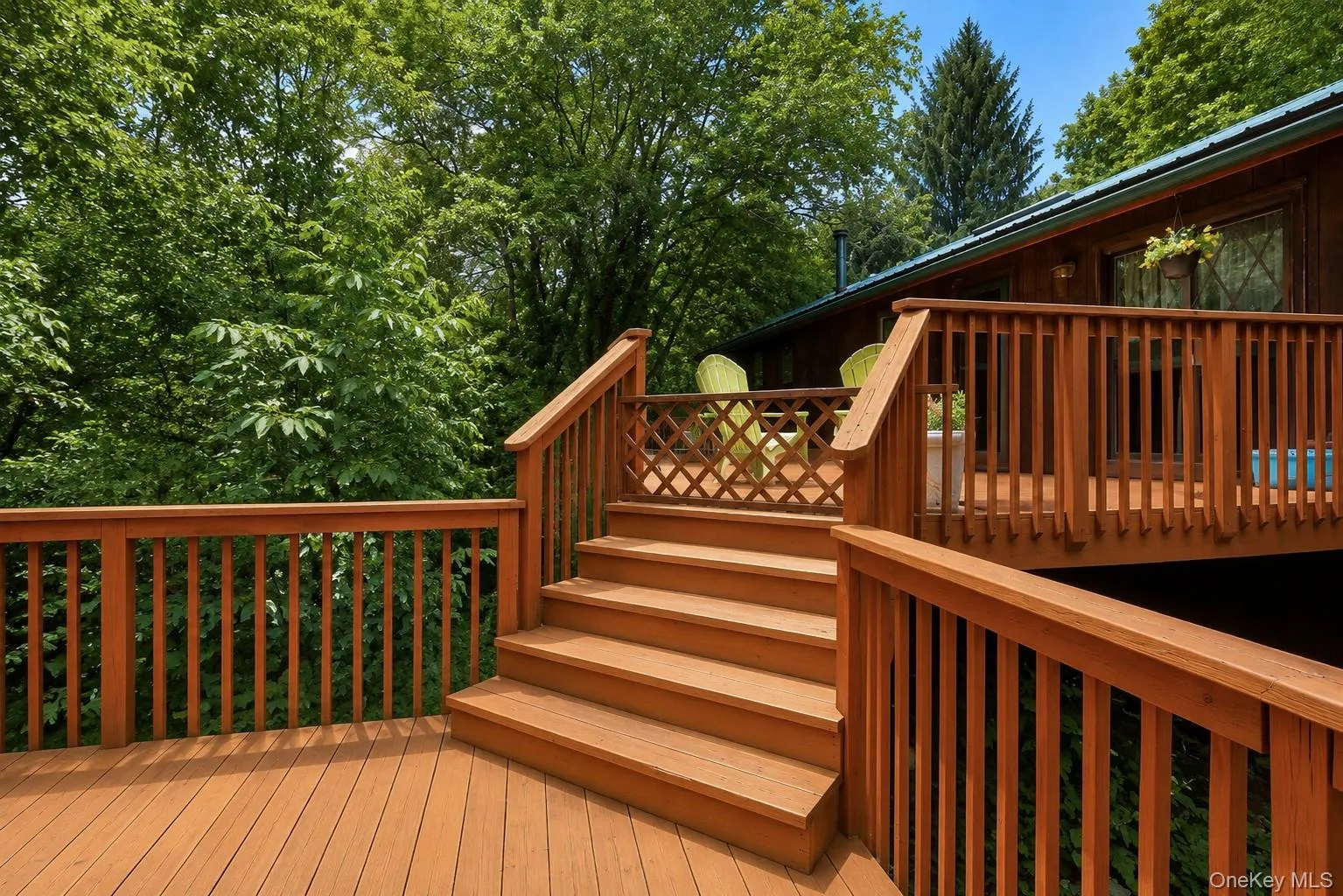 Multi-level deck featuring rich wood tones Multi-level deck featuring rich wood tones
