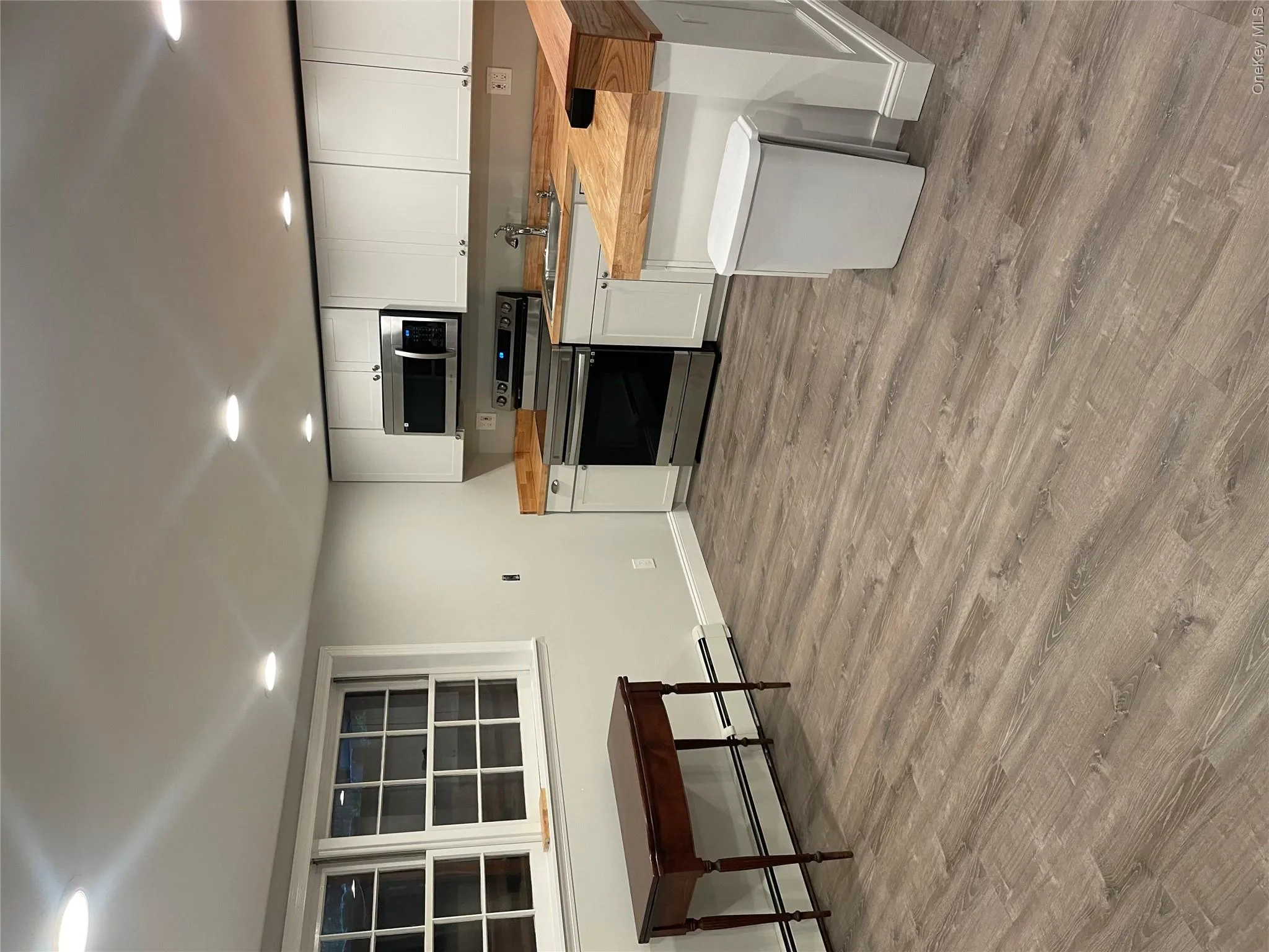 Large Windows in Kitchen features Natural Sun Light Large Windows in Kitchen features Natural Sun Light