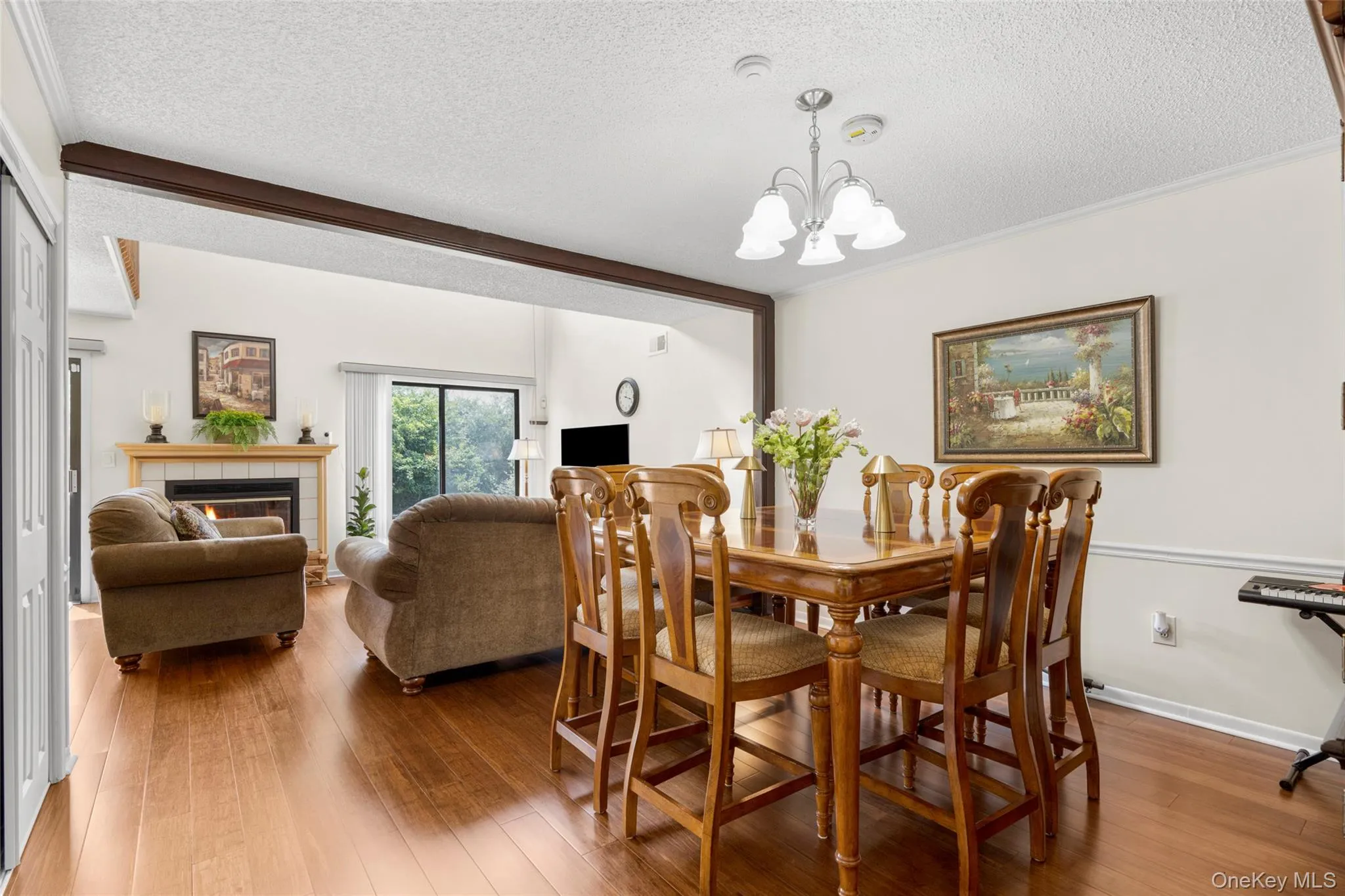 Stunning warm Chestnut color Bamboo Wood Floors welcome one to Main Living & 2nd Levels. The Wood floors add to elegant upscale ambiance of the Dining room & Living Room. Stunning warm Chestnut color Bamboo Wood Floors welcome one to Main Living & 2nd Levels. The Wood floors add to elegant upscale ambiance of the Dining room & Living Room.