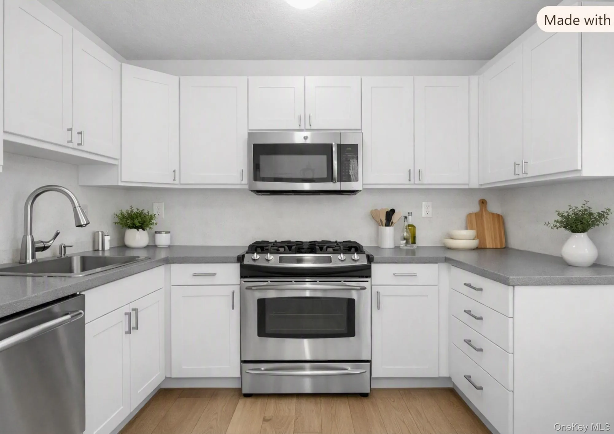Virtually Staged Kitchen showing updated kitchen with new cabinets, countertops and same stainless steel appliances, sink and faucet. Virtually Staged Kitchen showing updated kitchen with new cabinets, countertops and same stainless steel appliances, sink and faucet.