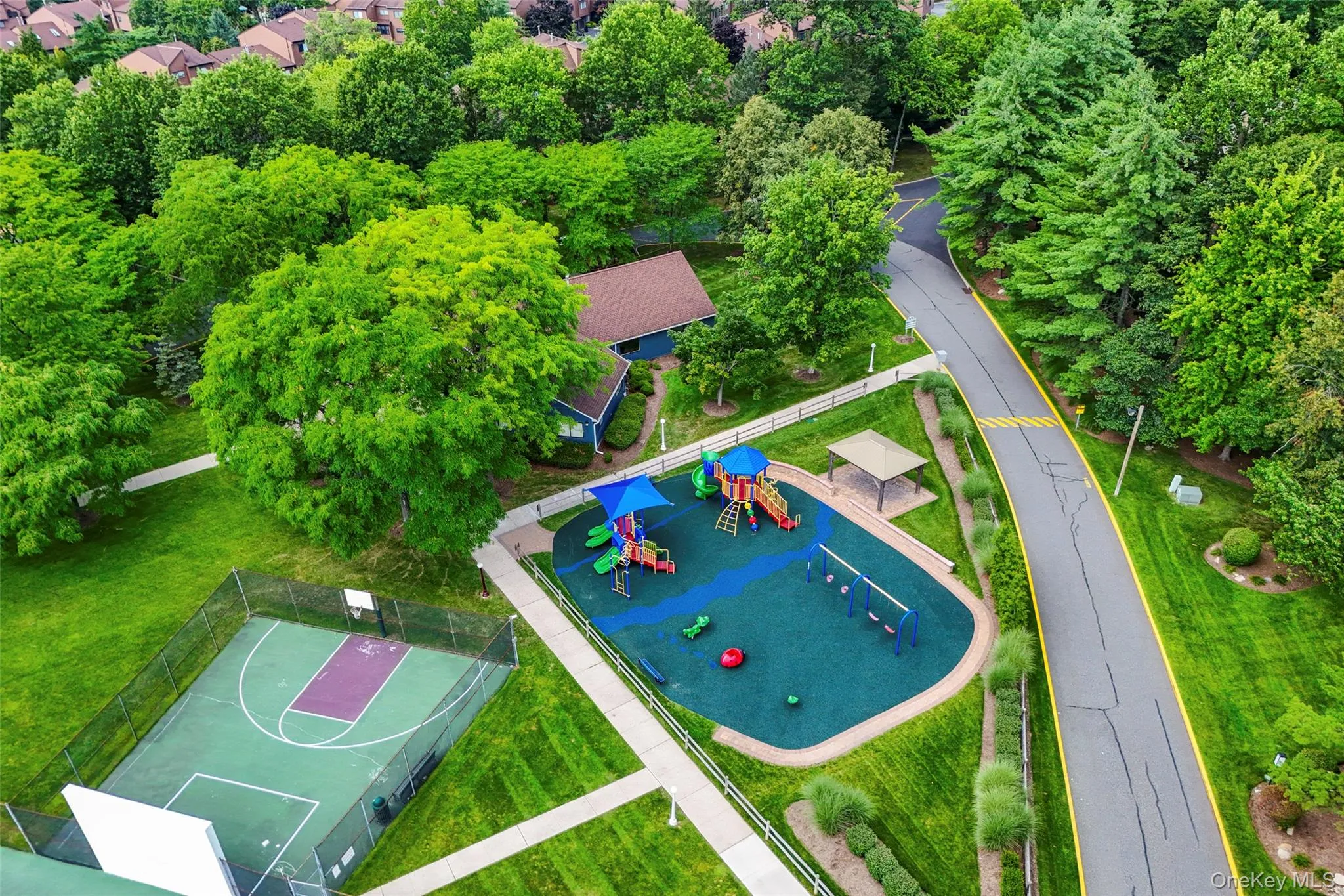 Basketball/Paddle Ball Courts plus Updated Children's Playground. Beyond kid's playground is newly renovated Clubhouse. Well maintained facilities, walkways & streets. Basketball/Paddle Ball Courts plus Updated Children's Playground. Beyond kid's playground is newly renovated Clubhouse. Well maintained facilities, walkways & streets.