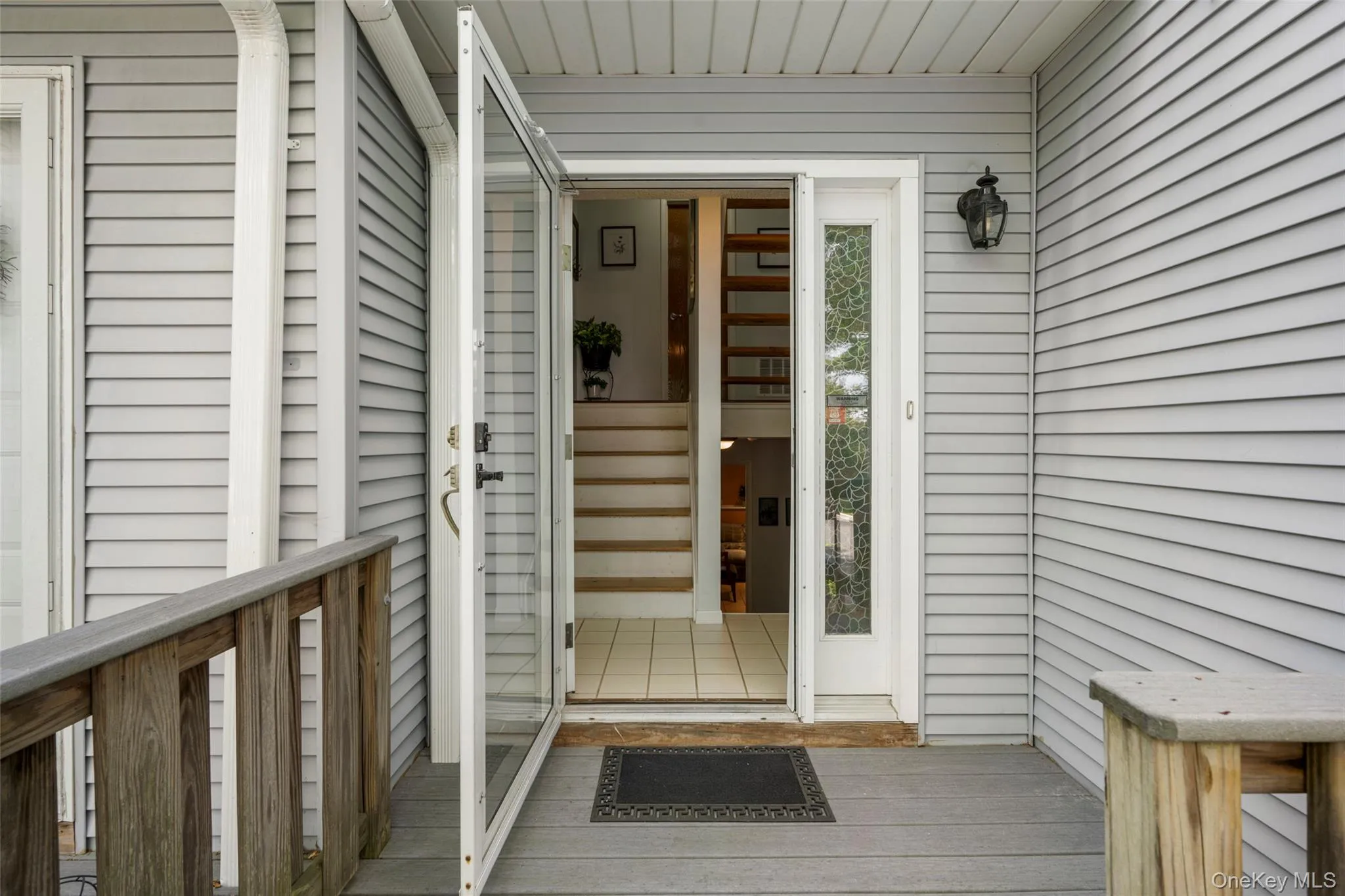 Accessing large Private Portico/Porch leads to private Front Entry door & Foyer. Plenty of space to add a bench or chair to front portico. Spacious surface to receive all those Amazon deliveries!!! Accessing large Private Portico/Porch leads to private Front Entry door & Foyer. Plenty of space to add a bench or chair to front portico. Spacious surface to receive all those Amazon deliveries!!!