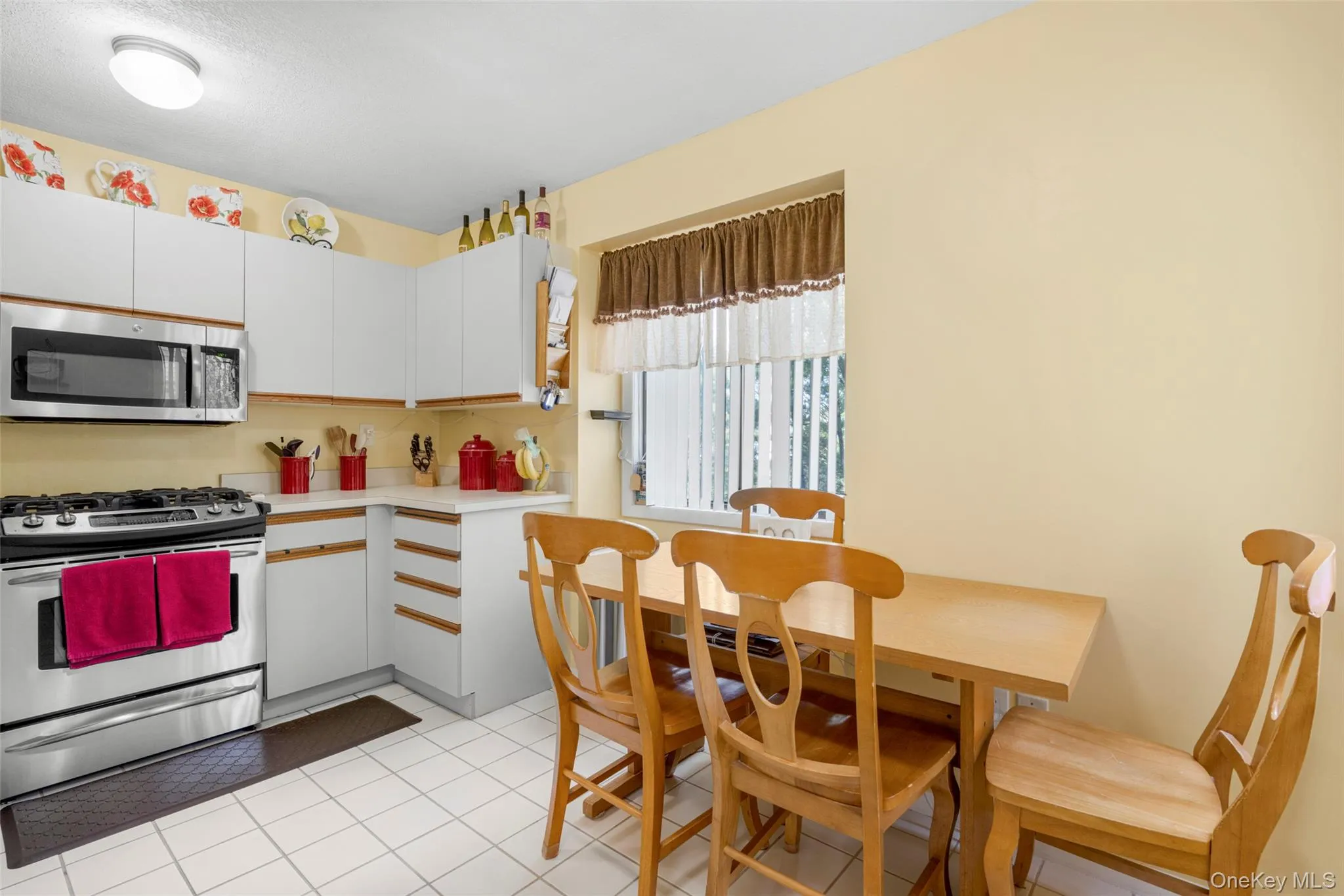 Spacious Bright Eat-in-Kitchen boasts two windows. Spacious Bright Eat-in-Kitchen boasts two windows.