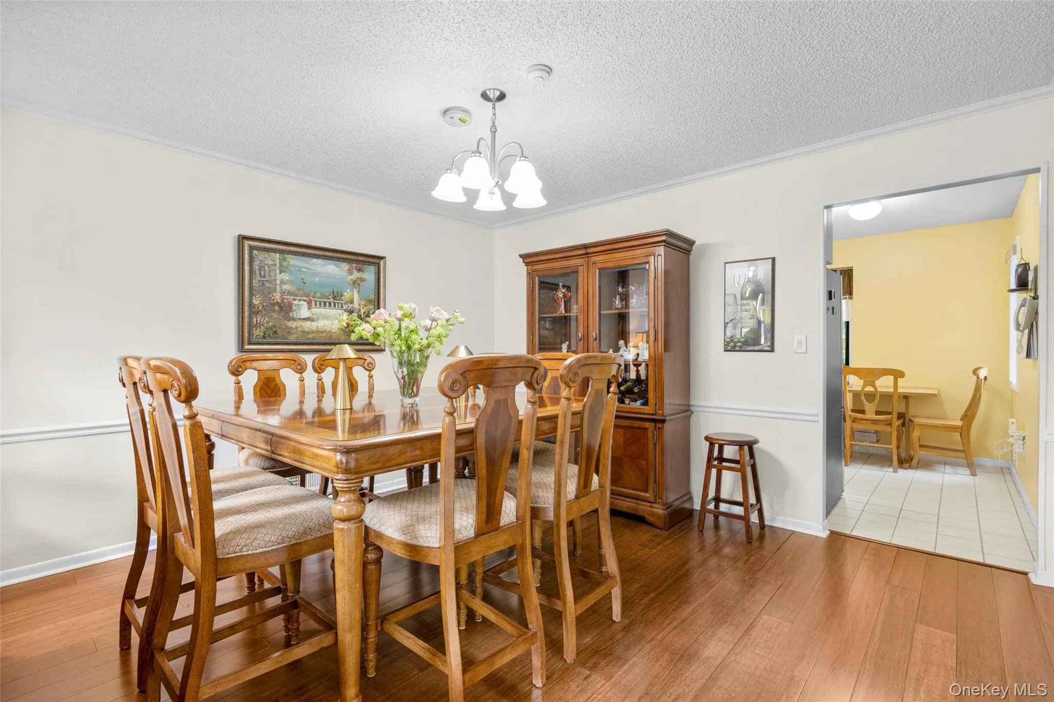 Spacious Dining Rm accommodates sizable dinner parties. This table accommodates eight chairs & has a leaf to create an even larger table for 10-12. Spacious Dining Rm accommodates sizable dinner parties. This table accommodates eight chairs & has a leaf to create an even larger table for 10-12.