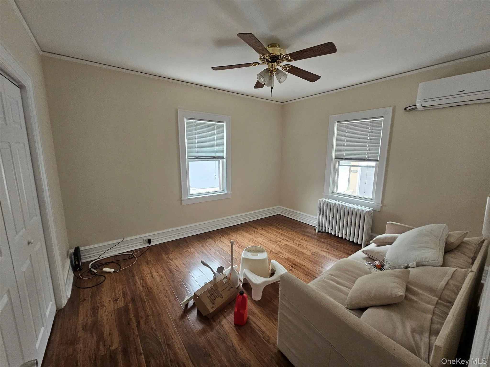 Main bedroom with ceiling fan and large walk-in closet Main bedroom with ceiling fan and large walk-in closet