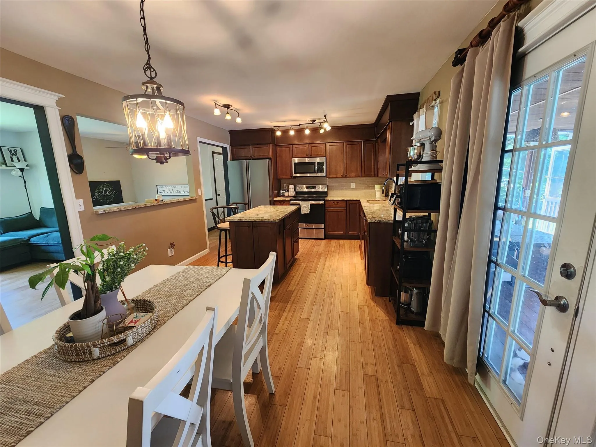 Wood floors, granite countertops Wood floors, granite countertops