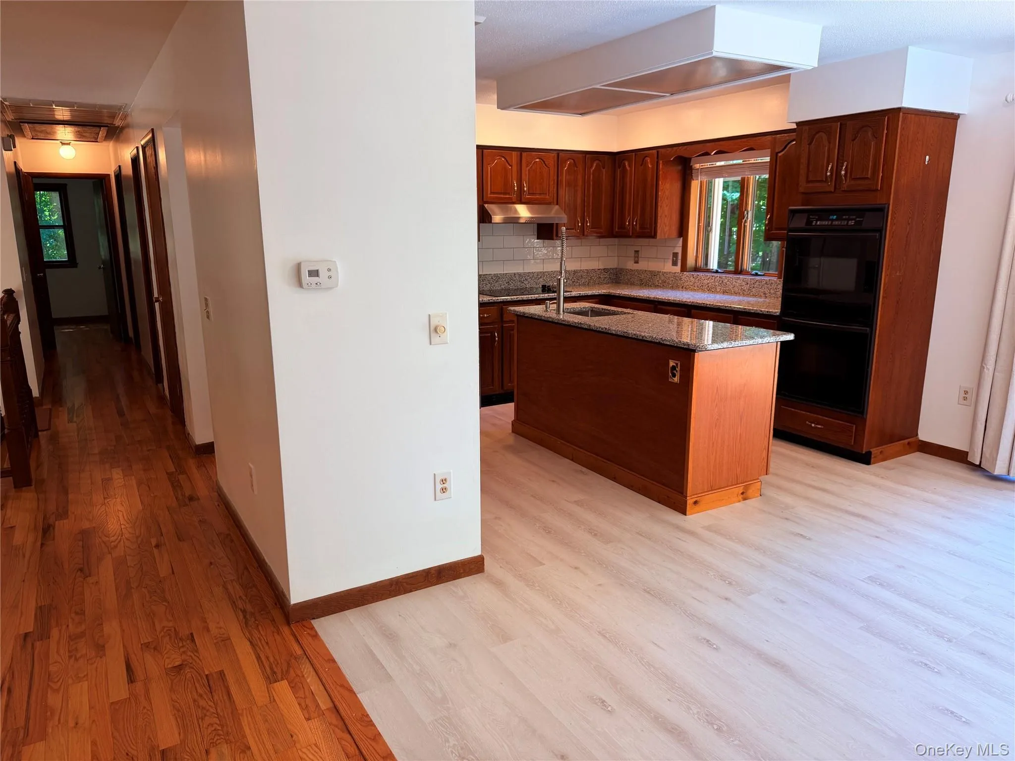 Double oven, island, new sink. Double oven, island, new sink.