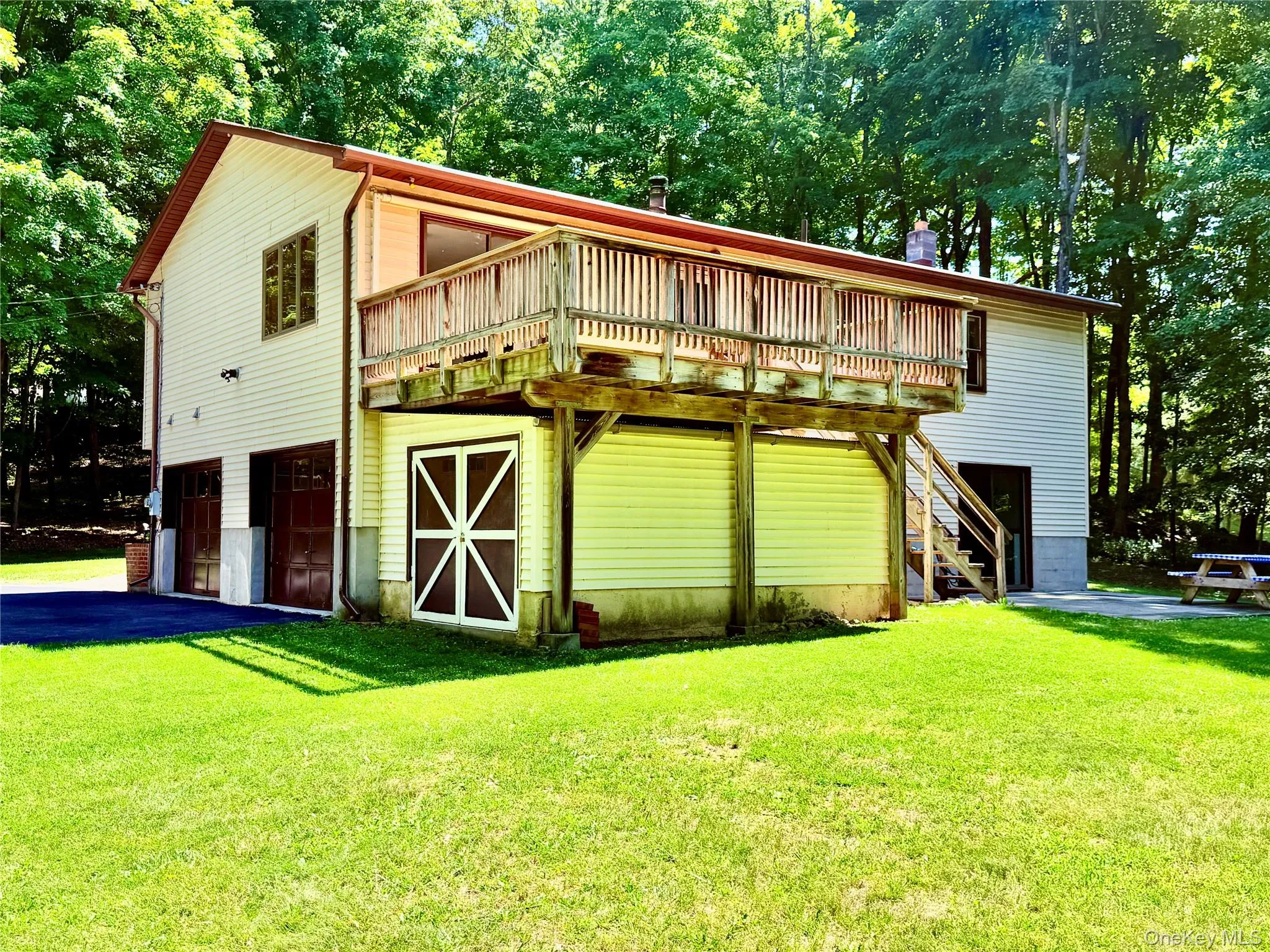 with side view of the 2 car garage with side view of the 2 car garage