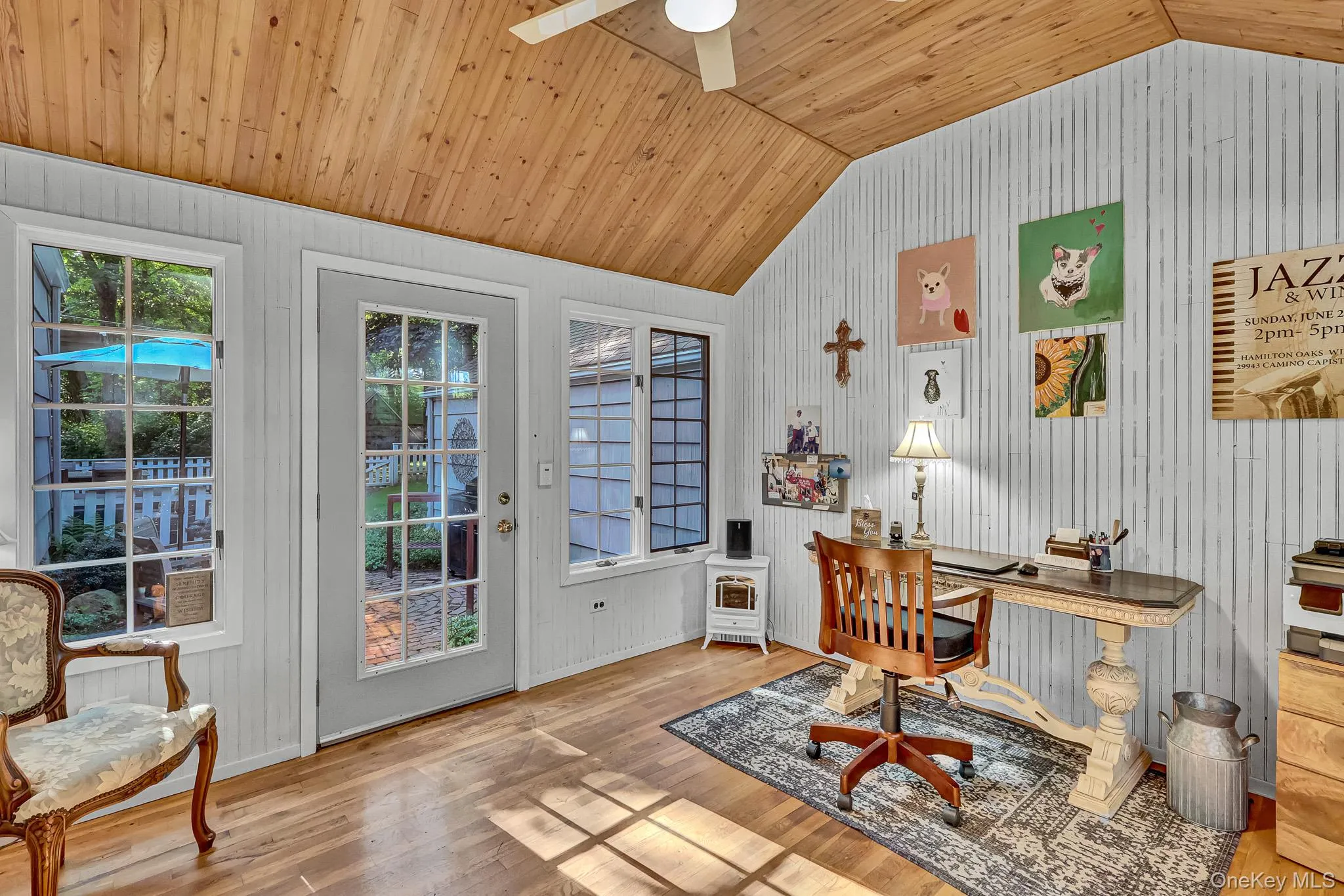 Sunroom/Office/Mud Room With Walls Of Windows, Vaulted Ceiling & Door To Courtyard. Sunroom/Office/Mud Room With Walls Of Windows, Vaulted Ceiling & Door To Courtyard.