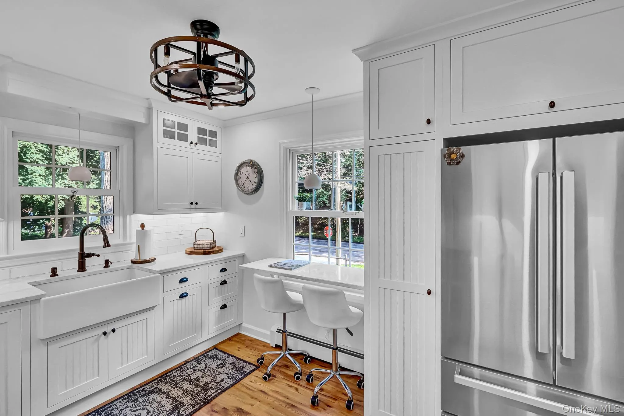 Newly Renovated Kitchen With Custom Cabinetry , New Hardwood Floors, Stainless Appliances, Quartz Counters & Breakfast Bar Open to Large Dining Room! Newly Renovated Kitchen With Custom Cabinetry , New Hardwood Floors, Stainless Appliances, Quartz Counters & Breakfast Bar Open to Large Dining Room!