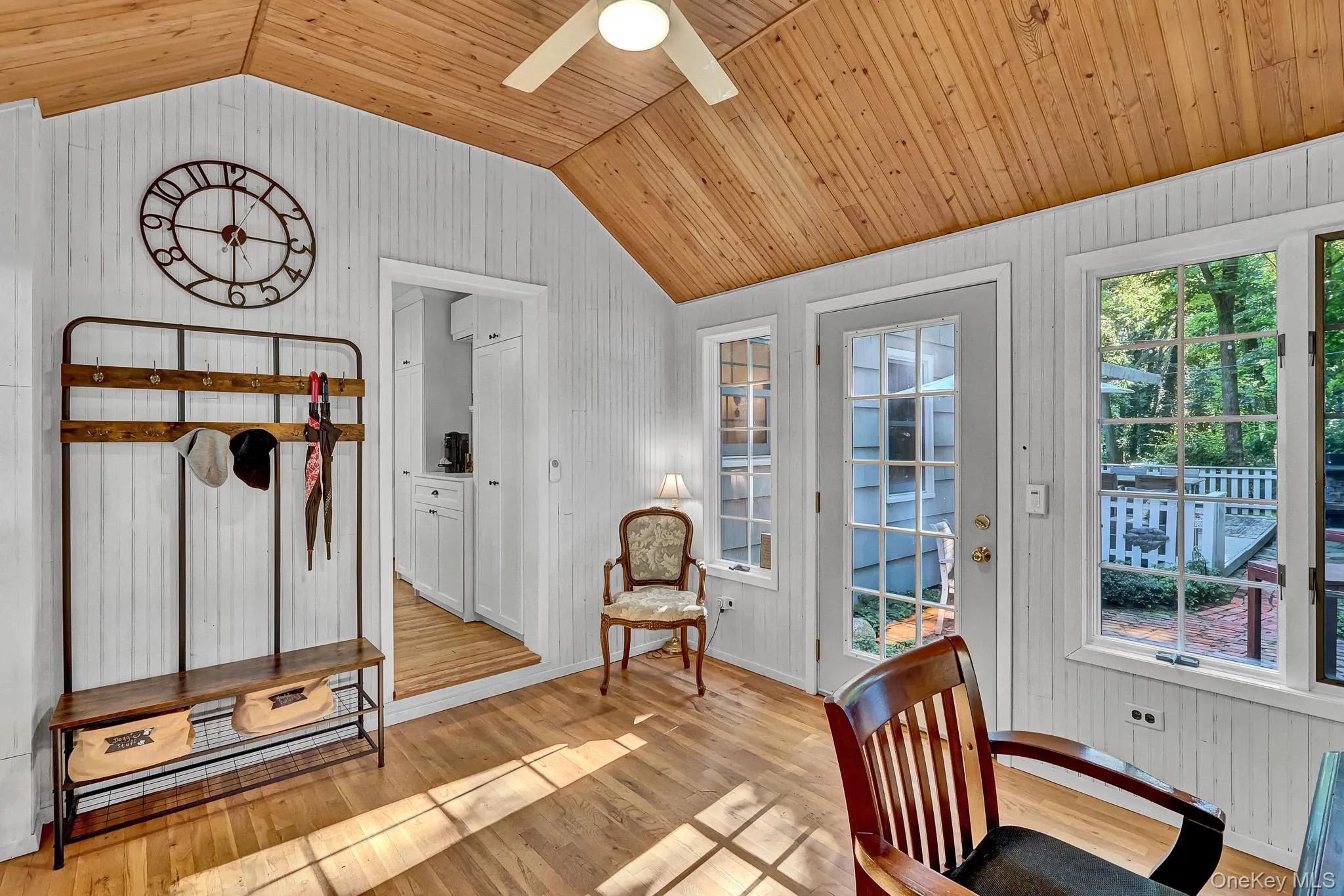 Sunroom/Office/Mud Room With Walls Of Windows, Vaulted Ceiling & Door To Courtyard. Sunroom/Office/Mud Room With Walls Of Windows, Vaulted Ceiling & Door To Courtyard.
