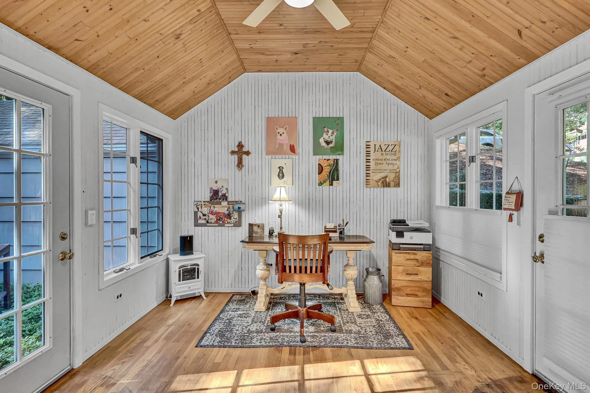 Sunroom/Office/Mud Room With Walls Of Windows, Vaulted Ceiling & Door To Courtyard. Sunroom/Office/Mud Room With Walls Of Windows, Vaulted Ceiling & Door To Courtyard.