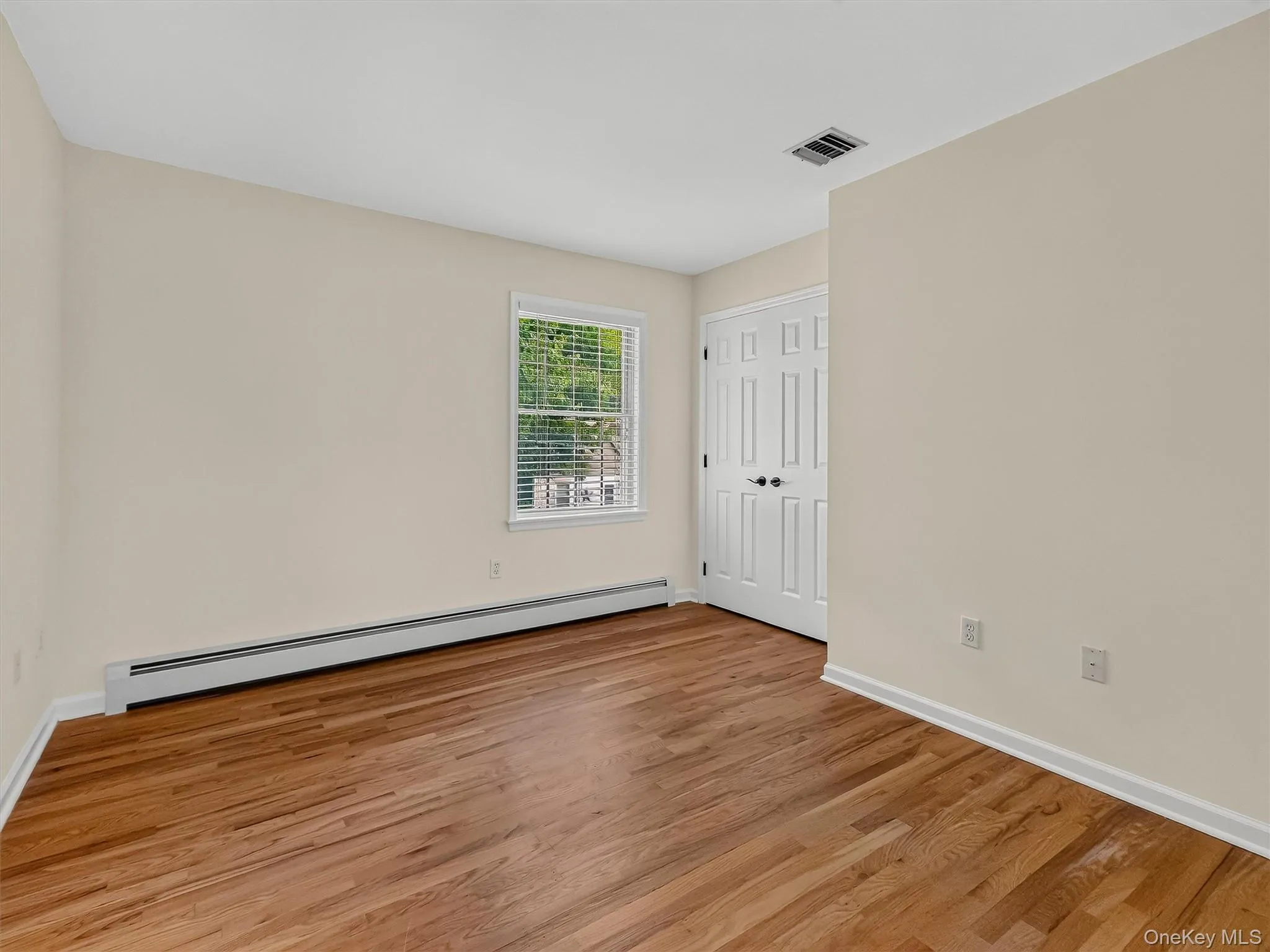 Another generously sized bedroom offers beautiful hardwood floors, natural light and plenty of room for comfortable everyday living. Another generously sized bedroom offers beautiful hardwood floors, natural light and plenty of room for comfortable everyday living.