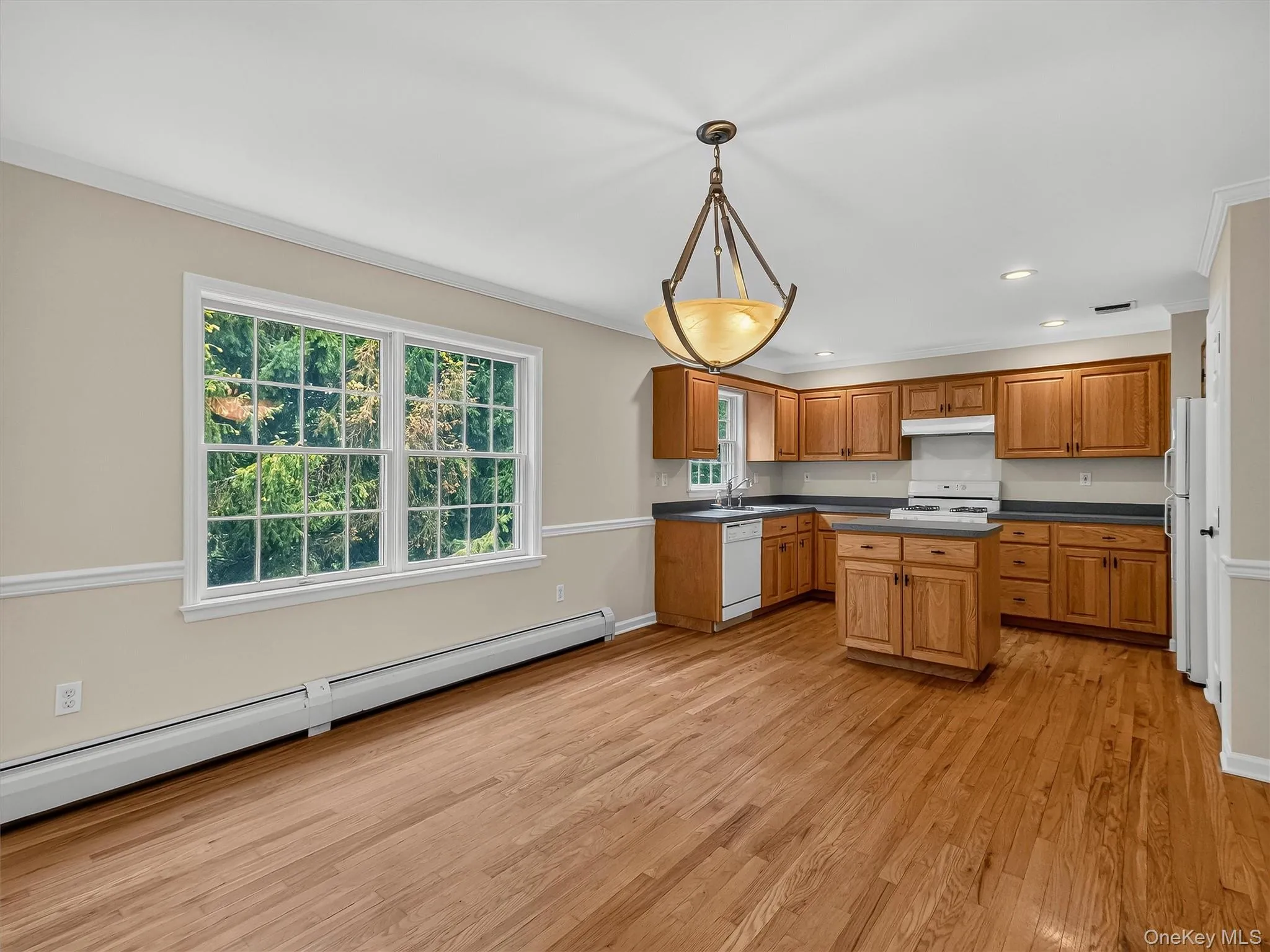 The spacious dining area is filled with natural light and offers ample room for everyday meals or occasional gatherings. The spacious dining area is filled with natural light and offers ample room for everyday meals or occasional gatherings.