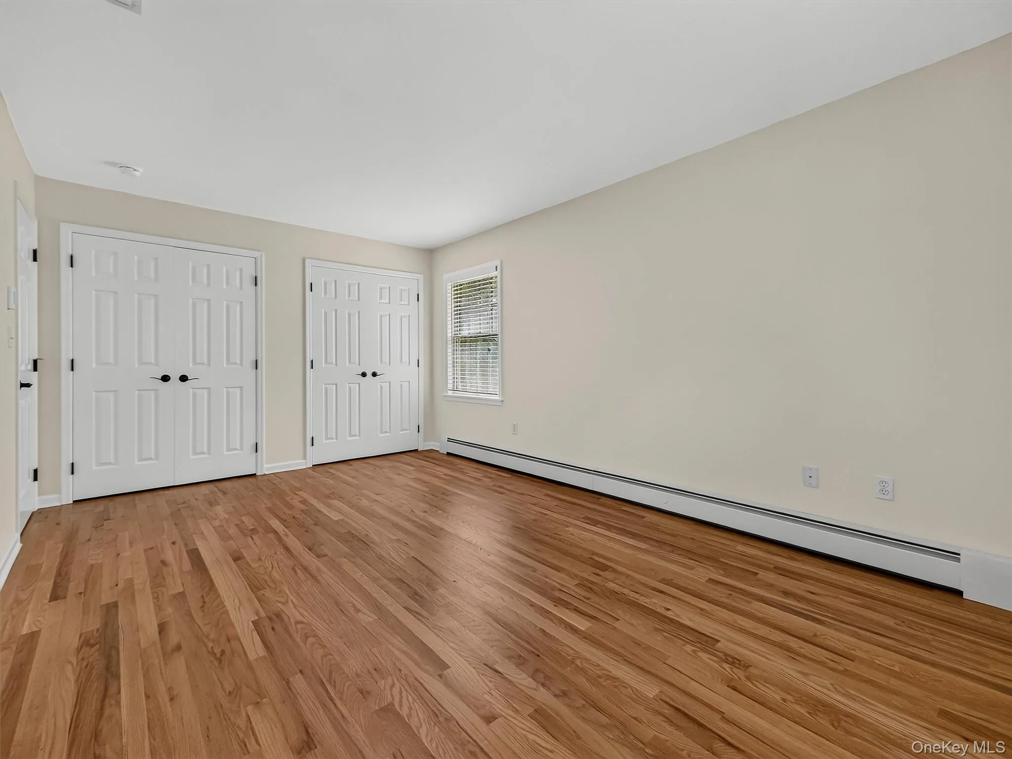 Double closets provide abundant storage without sacrificing the impressive size and versatility of the room. Double closets provide abundant storage without sacrificing the impressive size and versatility of the room.