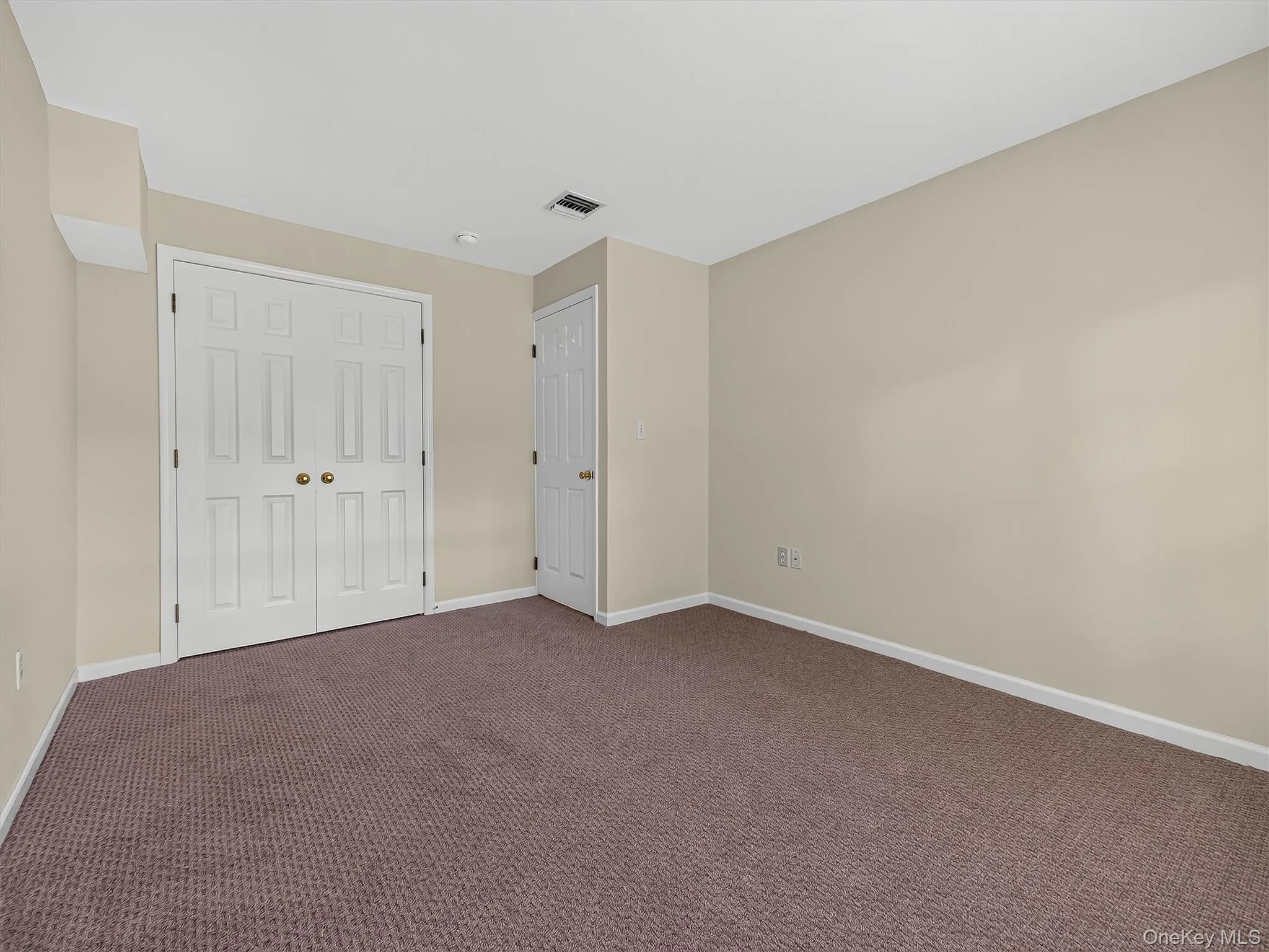 The finished lower level includes a spacious additional bedroom The finished lower level includes a spacious additional bedroom