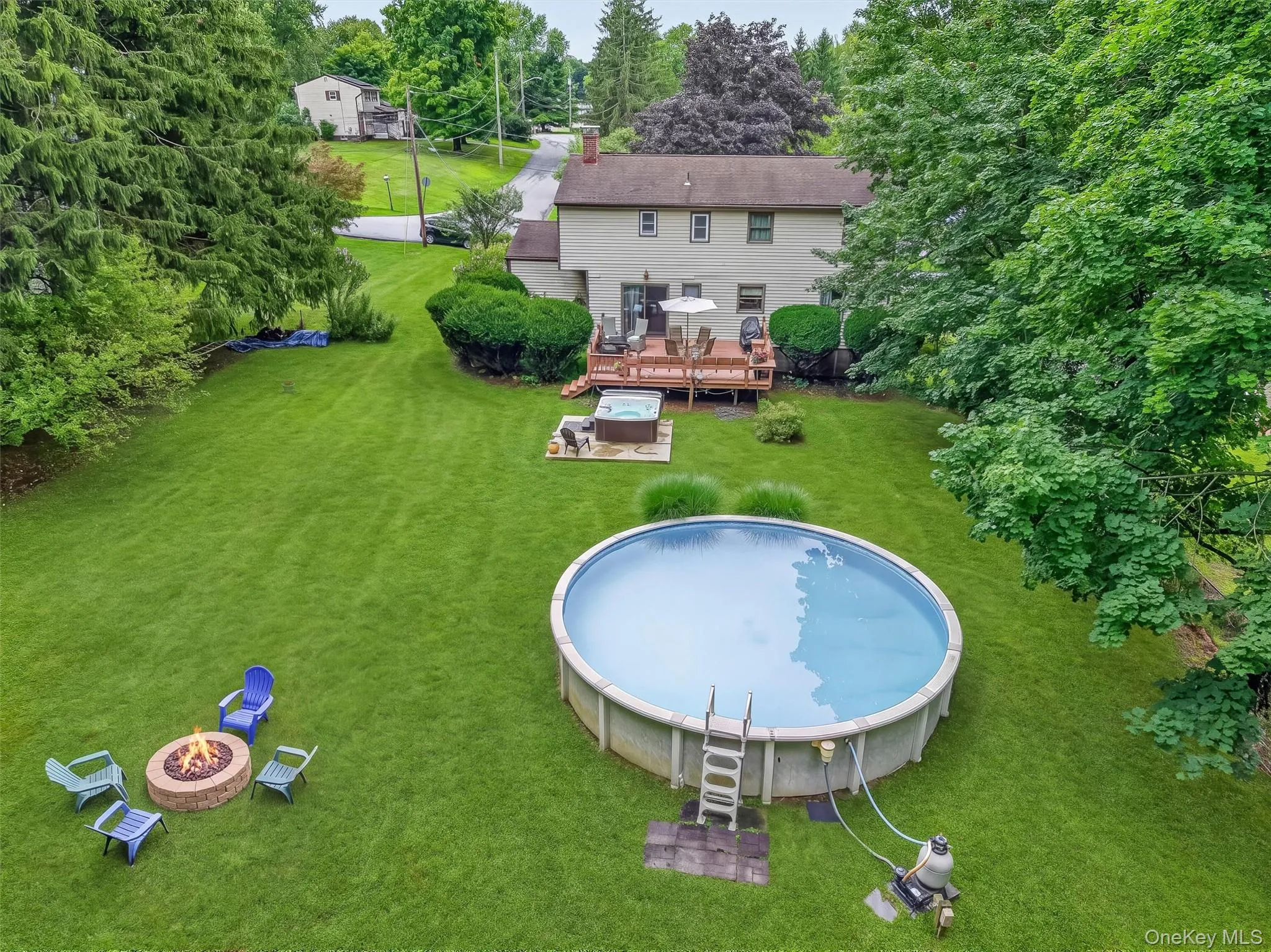 Aerial view with firepit hot tub and pool Aerial view with firepit hot tub and pool