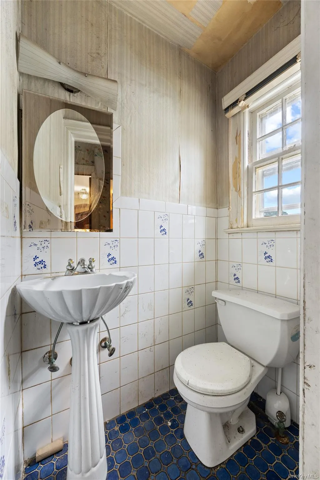 Powder room on first floor. Powder room on first floor.