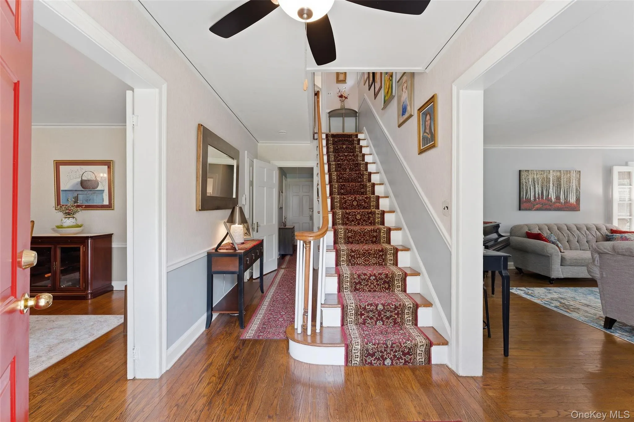 Center Hall opening into the Living Room and Dining Room. Center Hall opening into the Living Room and Dining Room.